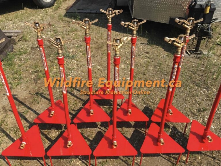 Group of red 31-inch ground spike sprinklers with 3/4-inch Rain Bird impact heads